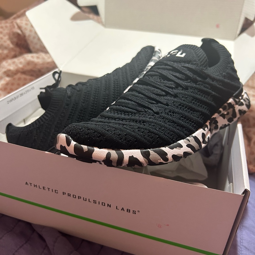 APL Black Athletic Shoes with Leopard Print Accents